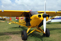 N88XC @ KOSH - EAA Airventure 2010. Also note the small formation of planes high in the sky. - by Connector