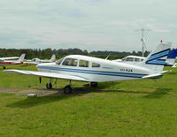 VH-VJA @ YCNK - Parked on the grass.