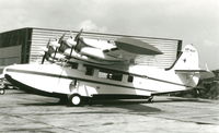 N3459C @ EGKK - N3459C (McKinnon G-21C s/n 1202) after it was sold to government of East Pakistan and re-registered as AP-AUY in Sept. 1967.  Photo taken at Gatwick Airport, near London, during ferry flight to East Pakistan. - by McKinnon Enterprises Inc.