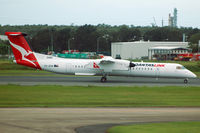 VH-QOM @ YBBN - At Brisbane - by Micha Lueck