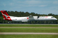 VH-QOT @ YBBN - At Brisbane - by Micha Lueck