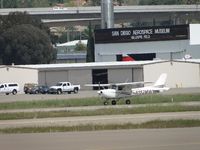 N152MW @ SEE - Temporarily stopped on runway 27R - by Helicopterfriend