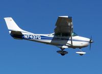 N7437Q @ EDU - On final EDU, side view