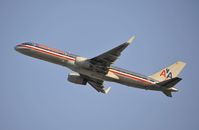 N621AM @ KLAX - Departing LAX on 25R - by Todd Royer
