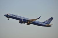 N590UA @ KLAX - Departing LAX on 25R - by Todd Royer