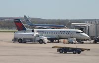 N973EV @ KTUL - CL-600-2B19 - by Mark Pasqualino