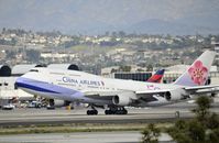 B-18208 @ KLAX - Departing LAX on 25R - by Todd Royer