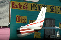 N6267D - Photographed in Seligman. Tailsection only. Airplanerides: $5.00! - by Bas Velders