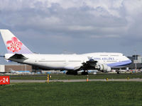 B-18209 @ AMS - Landing on runway 06 of Schiphol Airport - by Willem Göebel