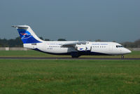 OY-RCC @ EIDW - Operating flight FLI 125, this RJ100 is about to depart off Rwy 10.