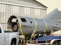 N17JL @ CNO - Tail assembly being trailered - by Helicopterfriend