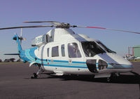 G-BWDO @ CAX - Sikorsky S-76B of Haughey Air seen at Carlisle Airport in September 2004. - by Peter Nicholson
