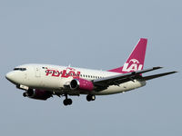 LY-AWF @ EHAM - Landing on runway C18 of Amsterdam Airport - by Willem Göebel