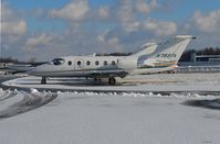N789TA @ CGF - N789TA seen in the snow at KCGF. - by aeroplanepics0112