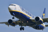EI-EKT @ EGGP - On approach to runway 27. - by Mark J Kopczewski