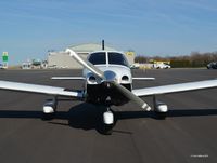 N917DK @ BKL - A nose view of N917DK, shot at KBKL. - by aeroplanepics0112