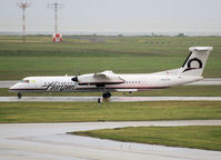 N427QX @ YVR - Taxi to the runway of Vancouver Airport - by Willem Göebel