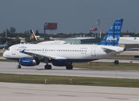 N598JB @ FLL - Taxi to the gate of FLL airport - by Willem Göebel