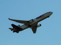 N576FE @ KMEM - Taking off from runway 36L