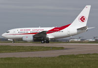 7T-VJQ @ EGSH - Departing EGSH after spray by Air Livery.