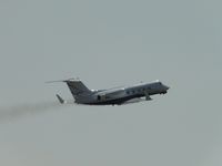 N380AC @ CNO - Wheels retracting and westbound - by Helicopterfriend