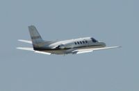 N550WS @ CNO - Wheels retracted and heading westbound - by Helicopterfriend