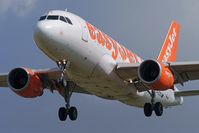 G-EZDX @ EGGP - On approach to runway 27. - by Mark J Kopczewski