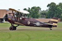 N9125 @ FA08 - 1931 White NEW STANDARD D-25A, c/n: 205 giving pleasure rides at Fantasy of Flight Museum , Polk City FL - by Terry Fletcher