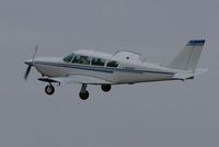 N9397P @ EDU - Over runway 35