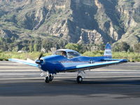 N8667H @ SZP - 1947 North American NAVION, Continental IO-520 285 Hp upgrade, Young Eagles warm-up flight taxi off Rwy 04. This NAVION always test flies before giving YE Flights. - by Doug Robertson