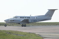G-IMEA @ EGGW - 1977 Beech 200, c/n: BB-302 at Luton - by Terry Fletcher