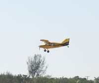 N30TF @ KAPF - Landing at Naples Municipal - by Bill Pahl