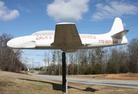 T-33 UNKNOWN - Need help with i.d. - so we can pass also onto Baugher and aerialvisuals site - this plane sits in front of a public storage facility about 30 miles south of Atlanta - by Florida Metal