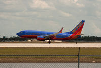 N475WN @ RSW - Landing 737 at RSW - by Mauricio Morro