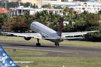 N657DL @ TNCM - N657DL