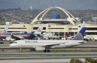 N434UA @ KLAX - Taxiing to gate at LAX - by Todd Royer