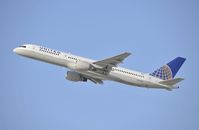 N540UA @ KLAX - Departing LAX on 25R - by Todd Royer