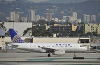 N837UA @ KLAX - Taxiing to Gate at LAX - by Todd Royer
