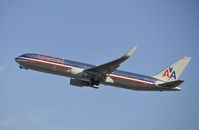 N381AN @ KLAX - Departing LAX on 25R - by Todd Royer