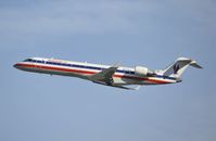 N529EA @ KLAX - Departing LAX on 25R - by Todd Royer