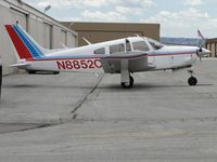 N8852C @ CNO - Parked by a hanger - by Helicopterfriend