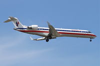 N534AE @ KORD - American Eagle Bombardier CL-600-2C10, EGF3765 arriving from Denver International/KDEN, RWY 10 approach KORD. - by Mark Kalfas