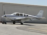 N184AJ @ CNO - Parked by the hanger - by Helicopterfriend