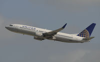 N14242 @ KLAX - Departing LAX on 25R - by Todd Royer