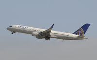 N518UA @ KLAX - Departing LAX on 25R - by Todd Royer