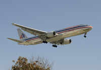 N348AN @ KLAX - Arriving at LAX on 24R - by Todd Royer