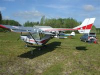 C-IHXJ @ CPE6 - Peter restored this plane, to virtual new condition.
Two Rotax 503 DCDI Inline. Warp Drive (3-blade) 60 props. The new center wing section allowed the removal of the rear strut and install of rear door. - by Dave Herron