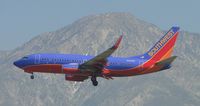 N442WN @ ONT - Approaching the outer fence - by Helicopterfriend