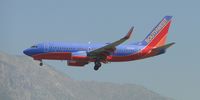 N244WN @ ONT - Approaching the outer fence - by Helicopterfriend