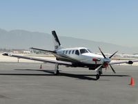 N3EK @ ONT - Parked on the southside - by Helicopterfriend